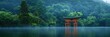 The iconic torii gate stands majestically on the shores of a misty lake, surrounded by forested hills in the tranquil morning light