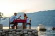 Couple in love drinking wine on romantic dinner at sunset on the beach. People love travel concept