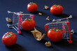 Fresh tomatoes, overturned supermarket carts and torn pieces of paper. Concept of trade problems, overproduction crisis, farm strikes and anti-globalization