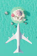 Airplane flying under summer tropical island with beach chairs, umbrellas and sun accessories in ocean. Summer travel concept. 3d render. Top view
