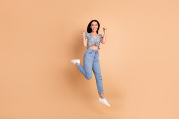 Poster - Photo of adorable cheerful lucky woman wear blue trendy clothes scream hooray isolated on beige color background