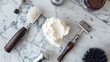 Elegant Arrangement of Shaving Tools on a Marble Countertop
