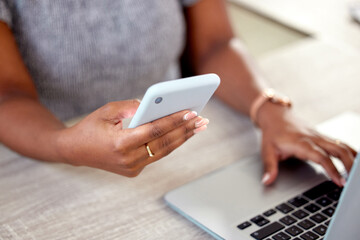 Poster - Hands, business and woman with laptop, cellphone and typing with connection, internet and hotspot for internet. Person, closeup or consultant at desk, computer and smartphone with social media or app