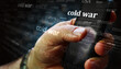 Cold war news titles on screen in hand 3d illustration