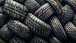 Pile of used car tires, closeup. Tires background
