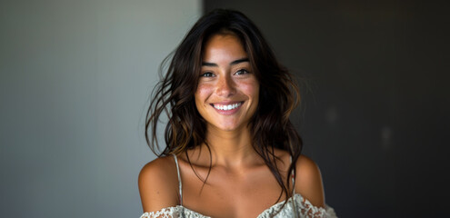 Wall Mural - Smiling young businesswoman in a modern office setting