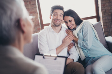 Canvas Print - Photo of young couple cuddle sit couch appointment psychotherapist loft interior office indoors