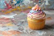 A delicious cupcake covered in colorful sprinkles, perfect for bakery or celebration concept