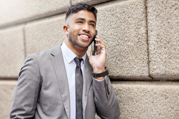 Poster - Phone call, smile and businessman on wall in city for talking, conversation and salesman listening to contact. Mobile, happy professional and discussion outdoor for deal, negotiation or networking