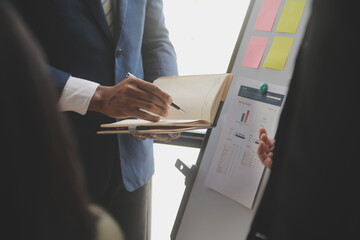 Co working conference, Business team meeting present, investor colleagues discussing new plan financial graph data on office table with laptop and digital tablet, Finance, accounting, investment.