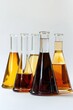 A row of glass flasks filled with liquid. Perfect for scientific and laboratory concepts