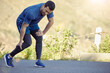 © peopleimages.com - Man, running and calf pain or outdoor cramp on mountain path in nature with muscle inflammation, injury or hurt. Male person, bruise and marathon training with leg or suffering, accident or strain