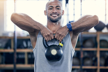 Poster - Fitness, kettlebell and portrait with bodybuilder man in gym for strength training or workout. Exercise, heavy and smile with happy bald athlete in health club for power or physical improvement