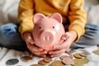 Child saving money in a piggy bank, focusing on financial education and responsibility,