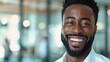 © LukaszDesign - Black businessman, smiling finance manager, corporate executive, and office trust. Face, happiness, and vision of growth-minded employee, worker, and leader