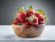 Strawberries with leaves on in a bowl on the table. Fruits and summer berries illustration