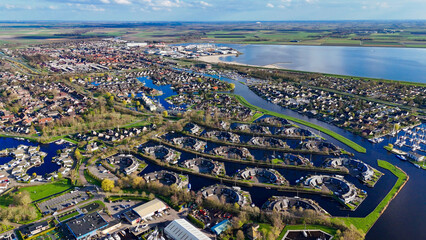 Wall Mural - Aerial drone view geometric pattern of water houses, marina, yachts Marina Park Lemmer Netherlands