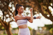 Stretching, fitness and Indian woman in nature for training, exercise and running outdoors. Sports, park and person for warm up, cardio workout and practice for wellness, performance and health