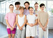 © JackF - Group portrait of cheerful teenage dancers in row in a choreographic studio