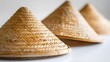 © Ziyan - woven bamboo hats on a white background