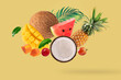 Set of fresh fruits and vegetables on yellow background.