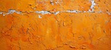 Fototapeta Londyn - Decaying Orange Wall Texture: A Wide Background of Rustic Elegance with Flaking Paint for Versatile Design Needs