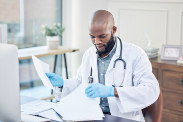 Male doctor, desk and paperwork and research, medical case and documents for cure. Office, report and reading of papers for medicine insurance, file record or analysis of results or notes from clinic