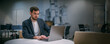 © Anna - Portrait of contemporary young businessman at a working laptop