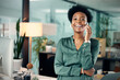 © peopleimages.com - African woman, portrait and office with phone call, smile and confidence for goals. Creative writer, professional news editor and expert reporter for content creation, publishing and press startup