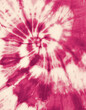 red - pink spiral tie dye design on fabric