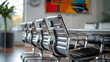 Side close-up of four steel chairs in front of the conference table in the conference room. Conference room view, office furniture. Upward shot, Low angle shot. Generative AI