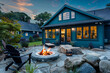 Dark turquoise Cape Cod style vacation home with a stone patio area featuring a fire pit, ideal for chilly evenings.