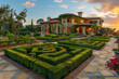 Elegant villa with a designed maze in the garden golden hour glow.