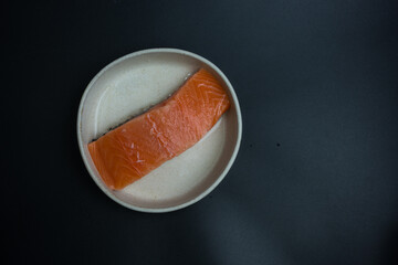 Wall Mural - Portioned raw salmon fillets. Top view with copy space.