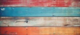 Fototapeta Przestrzenne - Closeup of a vibrant hardwood wall with a colorful pattern