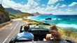 © Sasint - Couple driving in a convertible on a coastal road, enjoying the ocean breeze