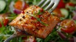  delicious fillet salmon, cucumber, onion, green salad on orange background, Concept of healthy diet and clean eating with fish and vegetables, balanced nutrition
