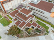Aerial view of the Institute for Nonlinear Science, futuristic building with squares on top of each other, flat roof at the University of California San Diego