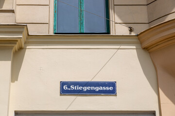 Wall Mural - A sign with the name of the Seidlgasse street on the facade of a house in Vienna