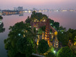 Aerial drone top view of Tran Quoc temple at night in Tay Ho district