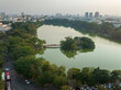Aerial drone top view of Hoan Kiem lake with Ngoc Son temple and The Huc bridge in Hanoi.