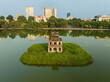 Drone closed view of Turtle tower in Hoan Kiem lake in Hanoi, Vietnam