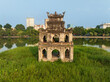 Drone closed view of Turtle tower in Hoan Kiem lake in Hanoi, Vietnam
