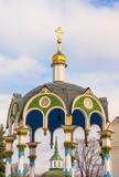 Fototapeta Las - The ornate openwork dome of the Holy Water Chapel in the Trinity-Sergius Lavra