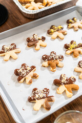 Wall Mural - Making Cutout Sugar Cookies, Chocolate-Dipped, Hazelnut-Sprinkled