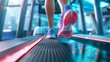Feet with colorful sneakers run on a high-tech treadmill. Modern gym equipment displays feet in running shoes.