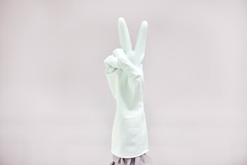 Sticker - Person, cleaner or hands for peace sign in gloves for good job with mockup space on grey background. Studio, cleaning or housekeeper showing satisfaction, support gesture or emoji for great service