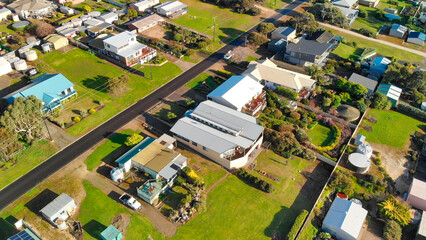 Wall Mural - Emu Bay homes and coastline, Kangaroo Island from drone, Australia