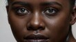 © Inspiraciones - Close-up portrait of a young african american woman.