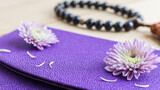 Fototapeta  - 日本のお葬式　紫の菊の花とふくさと珠数　袱紗